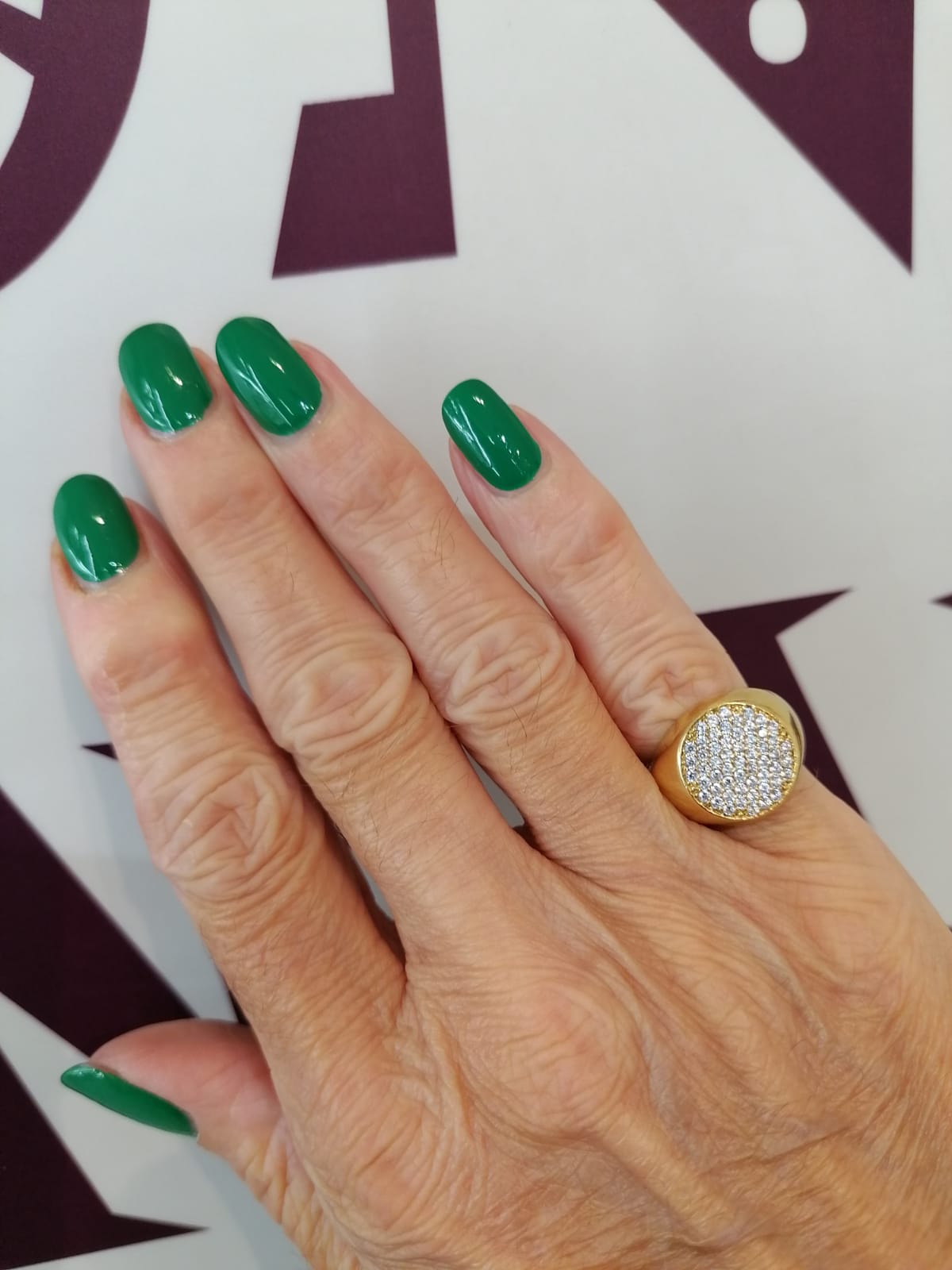 Chevalier rotondo dorato con zirconi